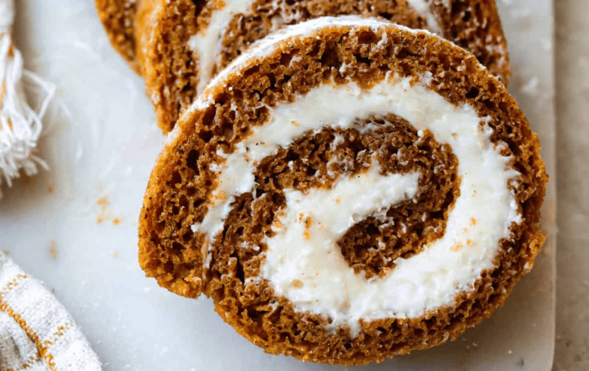 The Best Holiday Pumpkin Roll with Luscious Cream Cheese Filling